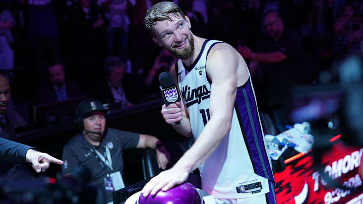 Apr 16, 2024; Sacramento, California, USA; Sacramento Kings forward Domantas Sabonis (10) lights the beam after the Kings defeated the Golden State Warriors during a play-in game of the 2024 NBA playoffs at the Golden 1 Center. Mandatory Credit: Cary Edmondson-Imagn Images