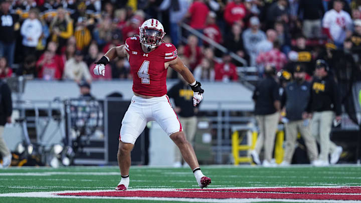 Oct 11, 2025; Madison, Wisconsin, USA; Wisconsin Badgers linebacker Tackett Curtis (4) celebrates a defensive stop against the Iowa Hawkeyes in the first quarter at Camp Randall Stadium. Mandatory Credit: Ross Harried-Imagn Images Oct 11, 2025; Madison, Wisconsin, USA; Wisconsin Badgers linebacker Tackett Curtis (4) celebrates a defensive stop against the Iowa Hawkeyes in the first quarter at Camp Randall Stadium. Mandatory Credit: Ross Harried-Imagn Images