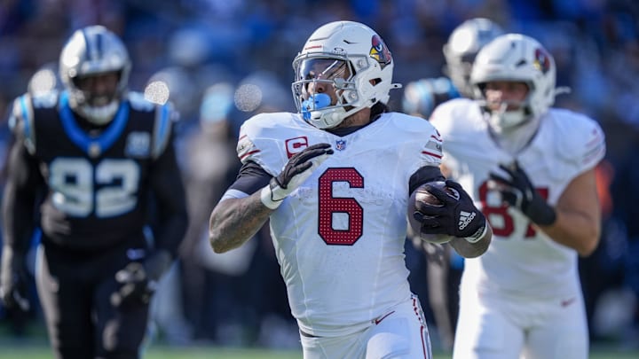 Dec 22, 2024; Charlotte, North Carolina, USA; Arizona Cardinals running back James Conner (6) runs for yardage against the Carolina Panthers during the second quarter at Bank of America Stadium. Mandatory Credit: Jim Dedmon-Imagn Images Dec 22, 2024; Charlotte, North Carolina, USA; Arizona Cardinals running back James Conner (6) runs for yardage against the Carolina Panthers during the second quarter at Bank of America Stadium. Mandatory Credit: Jim Dedmon-Imagn Images