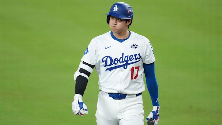 Oct 29, 2025; Los Angeles, California, USA; Los Angeles Dodgers two-way player Shohei Ohtani (17) reacts after grounding out against the Toronto Blue Jays in the eighth inning during game five of the 2025 MLB World Series at Dodger Stadium. Mandatory Credit: Kirby Lee-Imagn Images