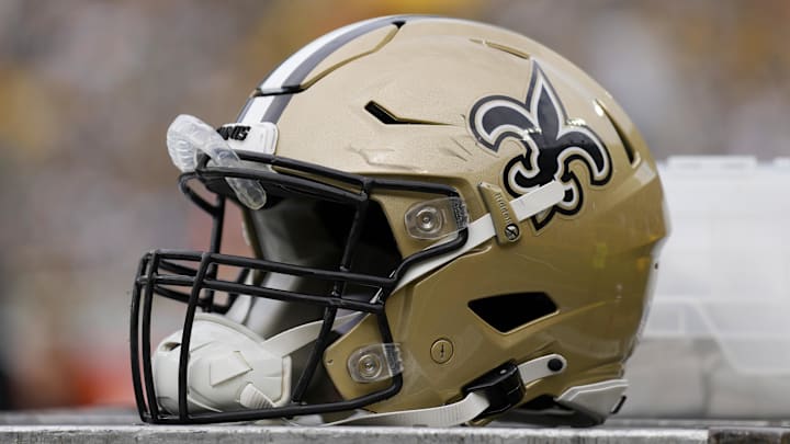 Sep 24, 2023; Green Bay, Wisconsin, USA; An New Orleans Saints helmet during warmups prior to the game against the Green Bay Packers at Lambeau Field. Mandatory Credit: Jeff Hanisch-Imagn Images Sep 24, 2023; Green Bay, Wisconsin, USA; An New Orleans Saints helmet during warmups prior to the game against the Green Bay Packers at Lambeau Field. Mandatory Credit: Jeff Hanisch-Imagn Images