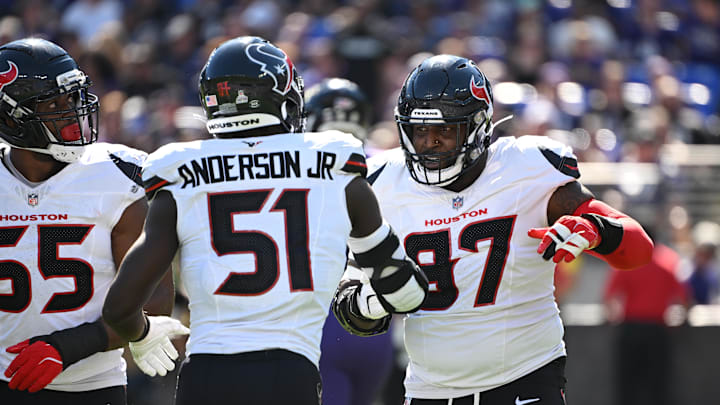 Oct 5, 2025; Baltimore, Maryland, USA; Houston Texans defensive tackle Mario Edwards (97) celebrates a sack with defensive end Will Anderson Jr. (51) and defensive end Danielle Hunter (55) during the second quarter at M&T Bank Stadium. Mandatory Credit: Rafael Suanes-Imagn Images Oct 5, 2025; Baltimore, Maryland, USA; Houston Texans defensive tackle Mario Edwards (97) celebrates a sack with defensive end Will Anderson Jr. (51) and defensive end Danielle Hunter (55) during the second quarter at M&T Bank Stadium. Mandatory Credit: Rafael Suanes-Imagn Images