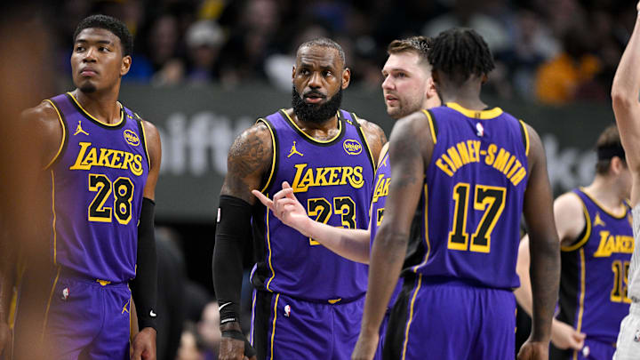 Apr 9, 2025; Dallas, Texas, USA; Los Angeles Lakers forward Rui Hachimura (28) and forward LeBron James (23) and guard Luka Doncic (77) and forward Dorian Finney-Smith (17) during the game between the Dallas Mavericks and the Los Angeles Lakers at American Airlines Center. Mandatory Credit: Jerome Miron-Imagn Images