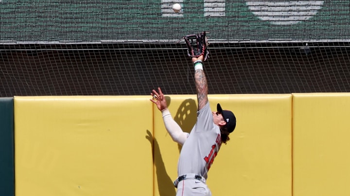 Sep 10, 2025; West Sacramento, California, USA; Boston Red Sox left fielder Jarren Duran (16) leaps for the ball hit by Athletics catcher Shea Langeliers (not pictured) during the first inning at Sutter Health Park. Mandatory Credit: Dennis Lee-Imagn Images Sep 10, 2025; West Sacramento, California, USA; Boston Red Sox left fielder Jarren Duran (16) leaps for the ball hit by Athletics catcher Shea Langeliers (not pictured) during the first inning at Sutter Health Park. Mandatory Credit: Dennis Lee-Imagn Images
