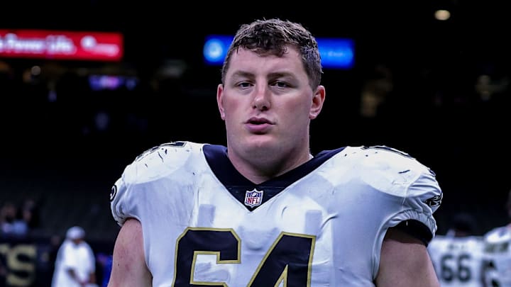 Aug 23, 2021; New Orleans, Louisiana, USA; New Orleans Saints center Will Clapp (64) walks to the locker room after the game against Jacksonville Jaguars during the second half at Caesars Superdome. Mandatory Credit: Stephen Lew-Imagn Images