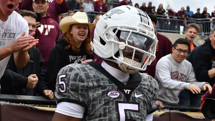 Nov 22, 2025; Blacksburg, Va.; Virginia Tech quarterback William Watson III (5) celebrates a touchdown against Miami.