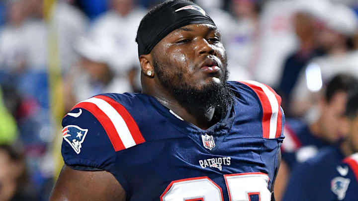 Oct 5, 2025; Orchard Park, New York, USA; New England Patriots defensive end Milton Williams (97) leaves the field after warming up before a game against the Buffalo Bills at Highmark Stadium. Oct 5, 2025; Orchard Park, New York, USA; New England Patriots defensive end Milton Williams (97) leaves the field after warming up before a game against the Buffalo Bills at Highmark Stadium.
