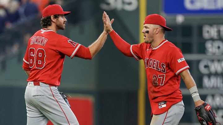 Mar 26, 2026; Houston, Texas, USA;Los Angeles Angels pitcher Jordan Romano (68) celebrates with right fielder Mike Trout (27) after defeating the Houston Astros at Daikin Park. Mandatory Credit: Thomas Shea-Imagn Images