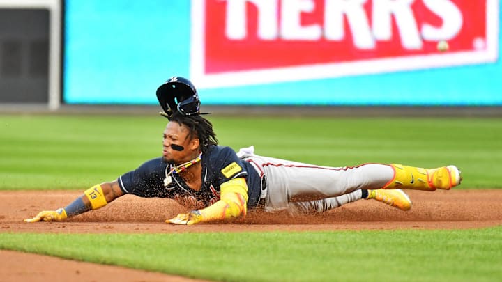 Oct 11, 2023; Philadelphia, Pennsylvania, USA;  Atlanta Braves right fielder Ronald Acuna Jr. (13)