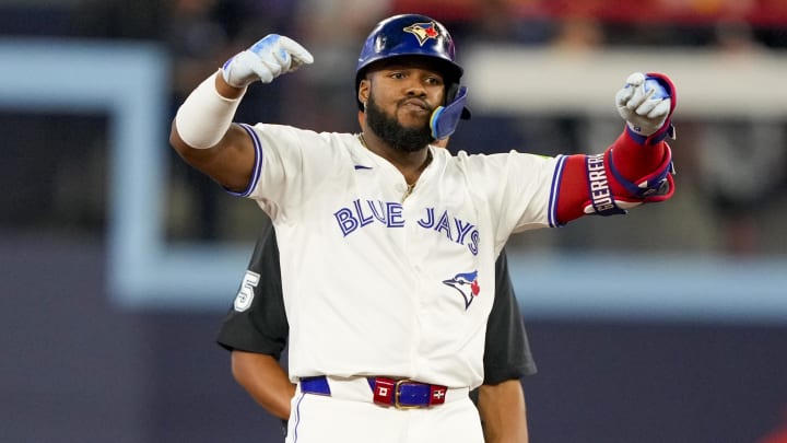 Jun 29, 2024; Toronto, Ontario, CAN; Toronto Blue Jays first base Vladimir Guerrero Jr. (27) celebrates his double against the New York Yankees during the sixth inning at Rogers Centre.