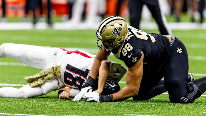 New Orleans Saints defensive end Payton Turner forces a fumble on Atlanta Falcons quarterback Kirk Cousins.