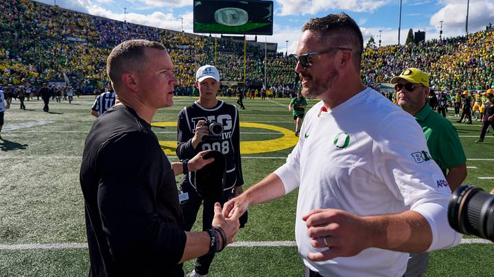Boise State head coach Spencer Danielson, left, and Oregon head coach Dan Lanning shake hands after Saturday's game. Boise State head coach Spencer Danielson, left, and Oregon head coach Dan Lanning shake hands after Saturday's game.