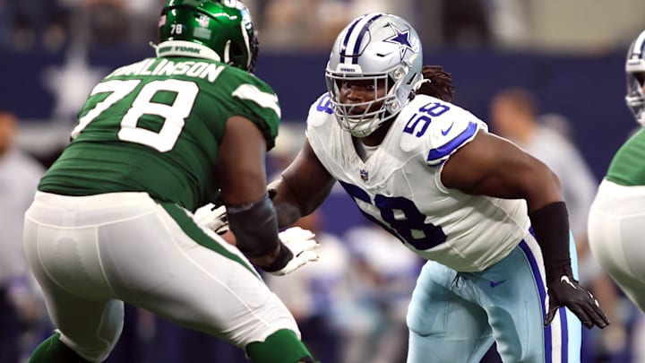Dallas Cowboys defensive tackle Mazi Smith (58) rushes the passer while blocked by New York Jets guard Laken Tomlinson (78).