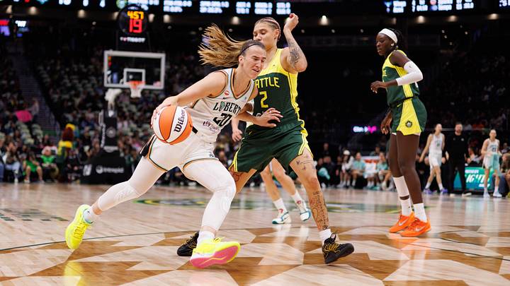 Jun 25, 2026; Seattle, Washington, USA; New York Liberty guard Sabrina Ionescu (20) drives against Seattle Storm guard Natisha Hiedeman (2) in the second half at Climate Pledge Arena. Mandatory Credit: Kevin Ng-Imagn Images