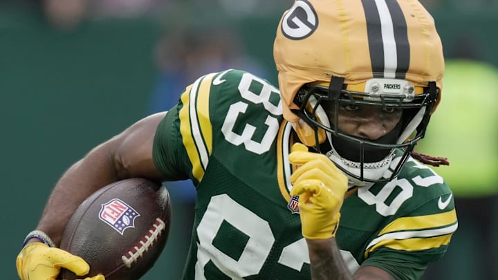 Green Bay Packers wide receiver Savion Williams (83) returns a punt during the third quarter of their game against the Minnesota Vikings Sunday, November 23, 2025 at Lambeau Field in Green Bay, Wisconsin.