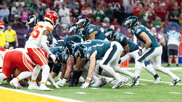 Feb 9, 2025; New Orleans, LA, USA; Philadelphia Eagles quarterback Jalen Hurts (1) lines up for the tush push play on the goal line against the Kansas City Chiefs during Super Bowl LIX at Ceasars Superdome.  
