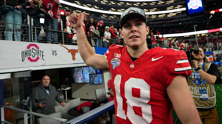Ohio State Buckeyes quarterback Will Howard (18) leaves the field following the Cotton Bowl Classic College Football Playoff semifinal game against the Texas Longhorns at AT&T Stadium in Arlington, Texas on Jan. 10, 2025. Ohio State won 28-14.