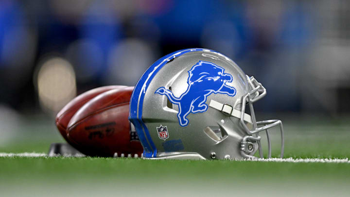 Jan 14, 2024; Detroit, Michigan, USA;  Footballs and a Detroit Lions helmet before a 2024 NFC wild card game between the Lions and Los Angeles Rams at Ford Field. Mandatory Credit: Lon Horwedel-Imagn Images