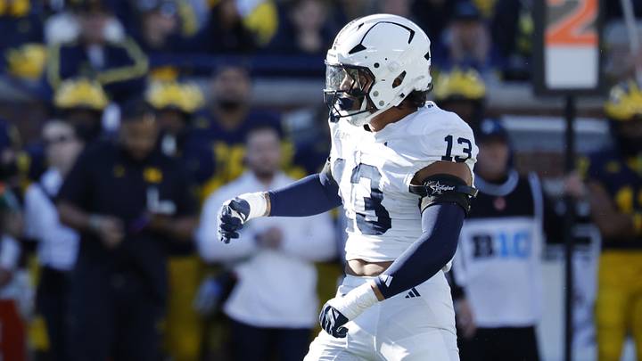 Penn State Nittany Lions linebacker Tony Rojas (13) celebrates a defensive play in the first quarter against the Michigan Wolverines at Michigan Stadium. Penn State Nittany Lions linebacker Tony Rojas (13) celebrates a defensive play in the first quarter against the Michigan Wolverines at Michigan Stadium.