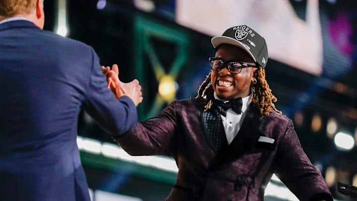 Ashton Jeanty shakes hands with NFL Commissioner Roger Goodell after being selected by the Las Vegas Raiders in the NFL Draft.