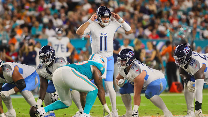 Sep 30, 2024; Miami Gardens, Florida, USA; Tennessee Titans quarterback Mason Rudolph (11) reacts before a play against the Miami Dolphins during the second quarter at Hard Rock Stadium. Mandatory Credit: Sam Navarro-Imagn Images