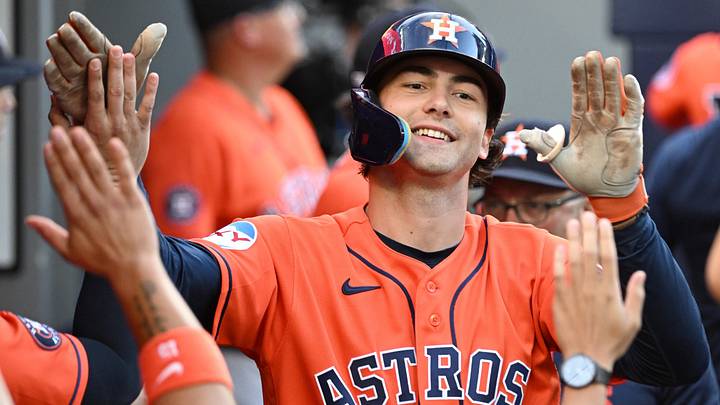 Houston Astros left fielder Joey Loperfido (10) celebrates in the dugout with teammates after hitting a three-run home run. 