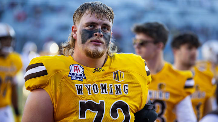 Dec 30, 2022; Tucson, AZ, USA; Wyoming Cowboys offensive tackle Caden Barnett (72) against the Ohio Bobcats during the 2022 Barstool Sports Arizona Bowl at Arizona Stadium. Mandatory Credit: Mark J. Rebilas-Imagn Images