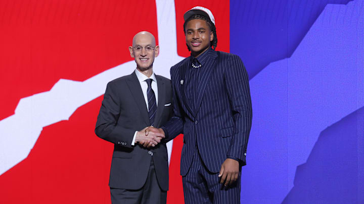 Jun 25, 2025; Brooklyn, NY, USA;  Collin Murray-Boyles stands with NBA commissioner Adam Silver after being selected as the ninth pick by the Toronto Raptors in the first round of the 2025 NBA Draft at Barclays Center. Mandatory Credit: Brad Penner-Imagn Images