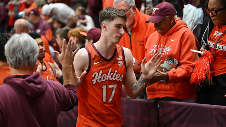 Feb 21, 2026; Blacksburg, Virginia, USA; Virginia Tech Hokies guard Neoklis Avdalas (17) celebrates with fans after the game at Cassell Coliseum. Mandatory Credit: Brian Bishop-Imagn Images Feb 21, 2026; Blacksburg, Virginia, USA; Virginia Tech Hokies guard Neoklis Avdalas (17) celebrates with fans after the game at Cassell Coliseum. Mandatory Credit: Brian Bishop-Imagn Images