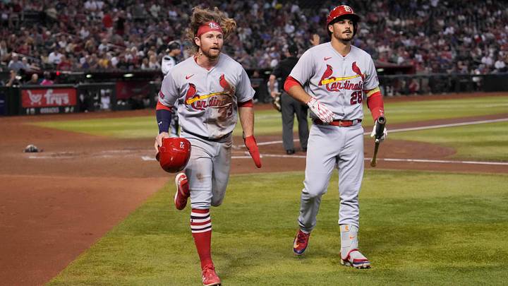 Jul 25, 2023; Phoenix, Arizona, USA; St. Louis Cardinals second baseman Brendan Donovan (33) celebrates with St. Louis Cardinals third baseman Nolan Arenado (28) after scoring a run against the Arizona Diamondbacks during the third inning at Chase Field. Mandatory Credit: Joe Camporeale-Imagn Images Jul 25, 2023; Phoenix, Arizona, USA; St. Louis Cardinals second baseman Brendan Donovan (33) celebrates with St. Louis Cardinals third baseman Nolan Arenado (28) after scoring a run against the Arizona Diamondbacks during the third inning at Chase Field. Mandatory Credit: Joe Camporeale-Imagn Images