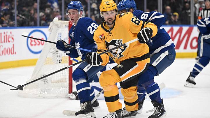 Dec 23, 2025; Toronto, Ontario, CAN;  Pittsburgh Penguins defenseman Erik Karlsson (65) pursues the play against the Toronto Maple Leafs in the second period at Scotiabank Arena. Mandatory Credit: Dan Hamilton-Imagn Images