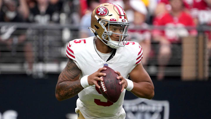 Aug 13, 2023; Paradise, Nevada, USA; San Francisco 49ers quarterback Trey Lance (5) throws the ball against the Las Vegas Raiders at in the first half at Allegiant Stadium.