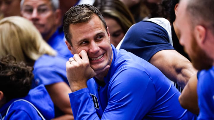Oct 3, 2025; Durham, NC, USA; Duke Blue Devils head coach Jon Scheyer smiles during the Countdown to Craziness at the Cameron Indoor Stadium. Mandatory Credit: Jaylynn Nash-Imagn Images Oct 3, 2025; Durham, NC, USA; Duke Blue Devils head coach Jon Scheyer smiles during the Countdown to Craziness at the Cameron Indoor Stadium. Mandatory Credit: Jaylynn Nash-Imagn Images