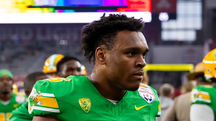 Jan 1, 2024; Glendale, AZ, USA; Oregon Ducks linebacker Devon Jackson (26) against the Liberty Flames during the 2024 Fiesta Bowl at State Farm Stadium. Mandatory Credit: Mark J. Rebilas-USA TODAY Sports Jan 1, 2024; Glendale, AZ, USA; Oregon Ducks linebacker Devon Jackson (26) against the Liberty Flames during the 2024 Fiesta Bowl at State Farm Stadium. Mandatory Credit: Mark J. Rebilas-USA TODAY Sports