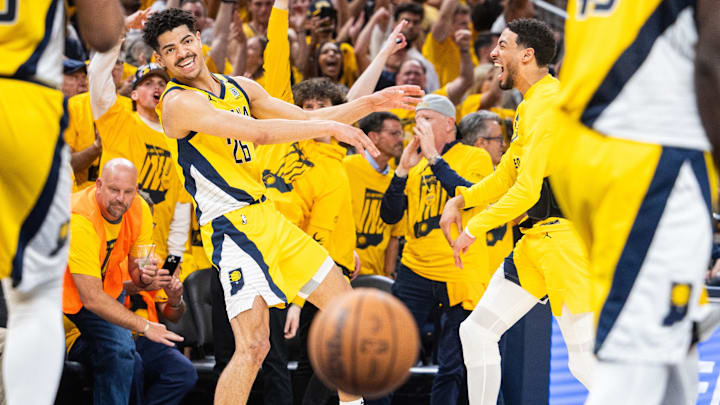 May 2, 2024; Indianapolis, Indiana, USA; Indiana Pacers guard Ben Sheppard (26) celebrates a basket with guard Tyrese Haliburton (0) during game six of the first round for the 2024 NBA playoffs against the Milwaukee Bucks at Gainbridge Fieldhouse. Mandatory Credit: Trevor Ruszkowski-Imagn Images