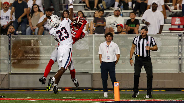 Emmanuel Karnley (23), then at Arizona, deflects a pass away from by New Mexico's Luke Wysong in 2024 Emmanuel Karnley (23), then at Arizona, deflects a pass away from by New Mexico's Luke Wysong in 2024