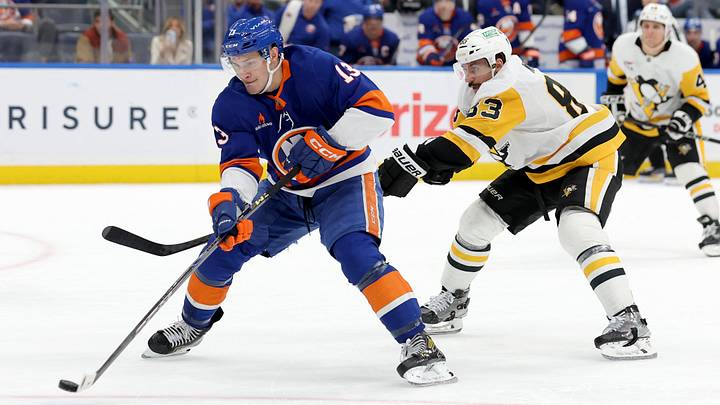 Dec 28, 2024; Elmont, New York, USA; New York Islanders center Mathew Barzal (13) takes a shot against Pittsburgh Penguins left wing Matt Nieto (83) during the second period at UBS Arena. Mandatory Credit: Brad Penner-Imagn Images Dec 28, 2024; Elmont, New York, USA; New York Islanders center Mathew Barzal (13) takes a shot against Pittsburgh Penguins left wing Matt Nieto (83) during the second period at UBS Arena. Mandatory Credit: Brad Penner-Imagn Images