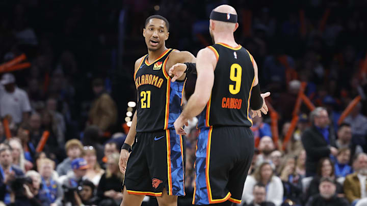 Jan 19, 2025; Oklahoma City, Oklahoma, USA; Oklahoma City Thunder guards Aaron Wiggins (21) and Alex Caruso (9) celebrates after scoring against the Brooklyn Nets during the second half at Paycom Center. Mandatory Credit: Alonzo Adams-Imagn Images