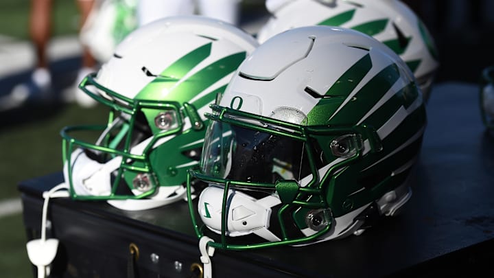 Sep 24, 2022; Pullman, Washington, USA; Oregon Ducks helmets sit during a game against the Washington State Cougars in the second half at Gesa Field at Martin Stadium. Mandatory Credit: James Snook-Imagn Images Sep 24, 2022; Pullman, Washington, USA; Oregon Ducks helmets sit during a game against the Washington State Cougars in the second half at Gesa Field at Martin Stadium. Mandatory Credit: James Snook-Imagn Images