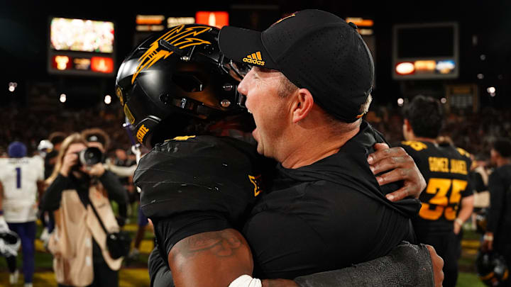 Sep 26, 2025; Tempe, Arizona, USA; Arizona State Sun Devils head coach Kenny Dillingham celebrates win with defensive back Myles Rowser (4) against TCU Horned Frogs at Mountain America Stadium, Home of the ASU Sun Devils. Mandatory Credit: Jacob Reiner-Imagn Images