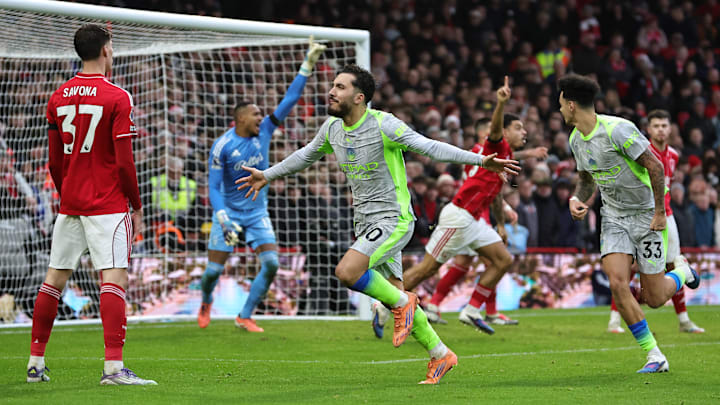 Rayan Cherki (middle) gave Man City all three points at The City Ground. 