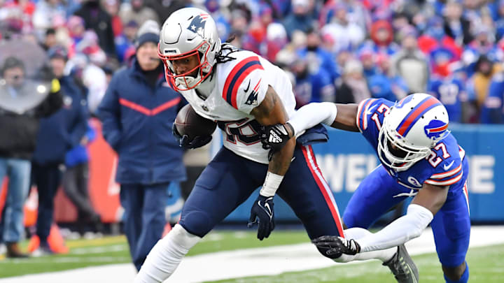 Jan 8, 2023; Orchard Park, New York, USA; New England Patriots wide receiver Jakobi Meyers (16) tries to break a tackle by Buffalo Bills cornerback Tre'Davious White (27) Jan 8, 2023; Orchard Park, New York, USA; New England Patriots wide receiver Jakobi Meyers (16) tries to break a tackle by Buffalo Bills cornerback Tre'Davious White (27)