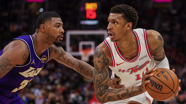 Mar 18, 2026; Houston, Texas, USA; Houston Rockets forward Jabari Smith Jr. (10) is defended by Los Angeles Lakers guard Marcus Smart (36) in the second quarter at Toyota Center. Mandatory Credit: Thomas Shea-Imagn Images