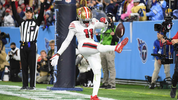 Dec 23, 2021; Nashville, Tennessee, USA; San Francisco 49ers wide receiver Brandon Aiyuk (11) kicks