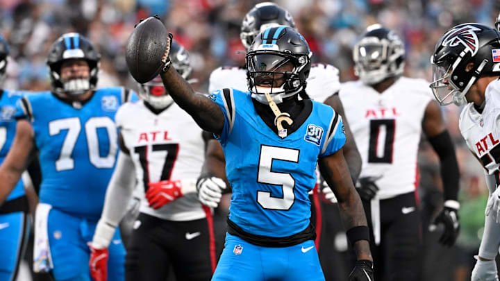 Oct 13, 2024; Charlotte, North Carolina, USA; Carolina Panthers wide receiver Diontae Johnson (5) reacts after making a catch in the second quarter at Bank of America Stadium. Mandatory Credit: Bob Donnan-Imagn Images