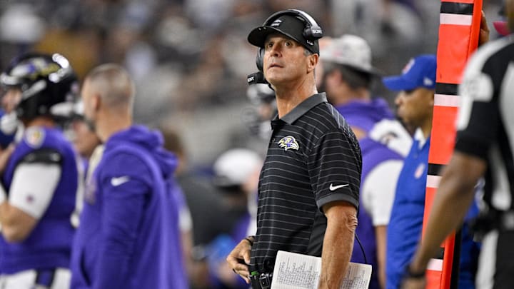 Aug 16, 2025; Arlington, Texas, USA; Baltimore Ravens head coach John Harbaugh looks on during the second half against the Dallas Cowboys at AT&T Stadium. Mandatory Credit: Jerome Miron-Imagn Images