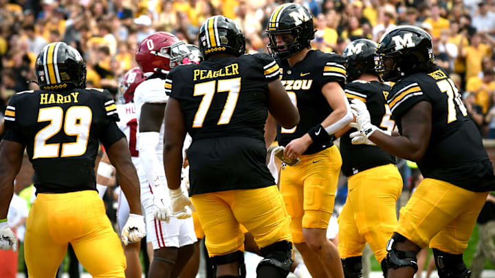 Oct 11, 2025; Columbia, MO; USA; Missouri Tigers quarterback Beau Pribula (9) celebrates after a touchdown in the third quarter against the Alabama Crimson Tide at Faurot Field at Memorial Stadium.