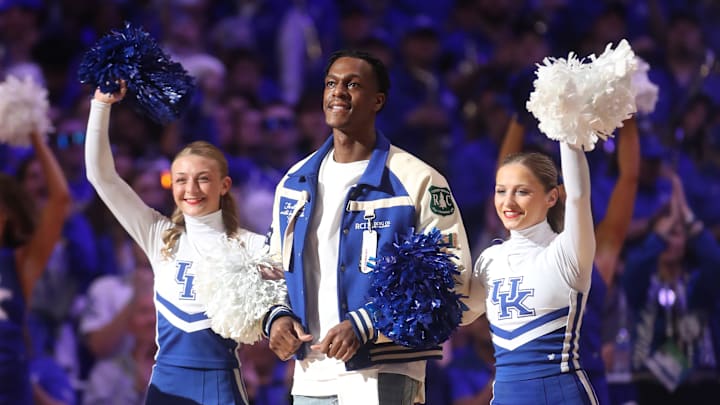 Former Kentucky player Rajon Rondo was the    Y    against Kansas.
Jan. 28, 2023