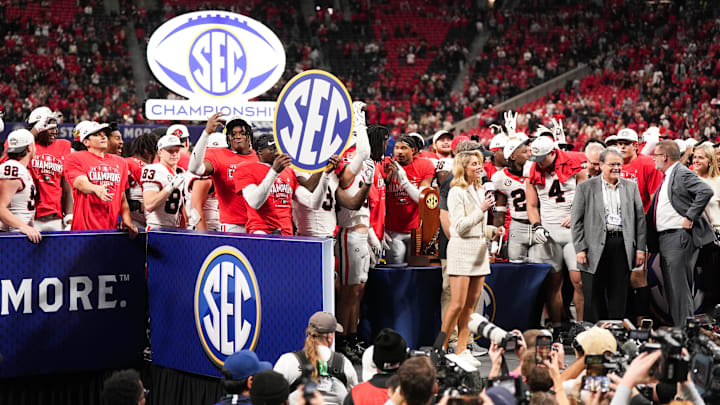 Dec 6, 2025; Atlanta, GA, USA; Georgia Bulldogs celebrate winning the SEC Championship against the Alabama Crimson Tide during the 2025 SEC Championship game at Mercedes-Benz Stadium. Mandatory Credit: Dale Zanine-Imagn Images Dec 6, 2025; Atlanta, GA, USA; Georgia Bulldogs celebrate winning the SEC Championship against the Alabama Crimson Tide during the 2025 SEC Championship game at Mercedes-Benz Stadium. Mandatory Credit: Dale Zanine-Imagn Images