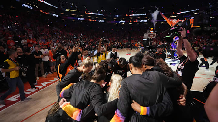 The Phoenix Mercury huddle up before their WNBA Finals game against Las Vegas Aces at Mortgage Matchup Center in Phoenix on Oct. 8, 2025.